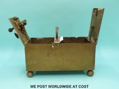 A Rich, Bridgwater Pantentee brass/bronze tobacco honesty box, one end with coin mechanism,