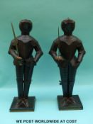 A pair of tinplate model knights,