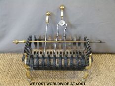 A small fire basket and fire tools (width 48cm)