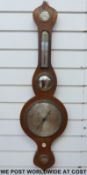 A late 19th century mahogany cased barometer,