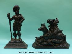 Two cast iron door stops,