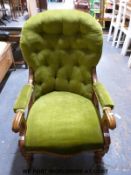 A 19th century oak framed upholstered armchair, serpentine fronted,