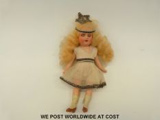 Armand Marseille miniature composite doll dressed as a fairy, with open mouth,
