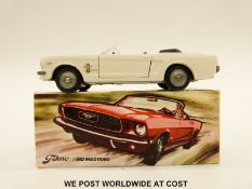 Tekno diecast model Ford Mustang with white body and red interior, 833, in original box.