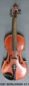 A cased German made violin labelled copy of Antonius Stradivorius, with 36.