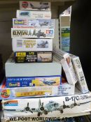 Twelve Airfix, Tamiya, Revell and other model kits including aircraft, military vehicles etc,