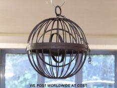 An unusual possibly blacksmith made cage with multi-gimballed centre platform