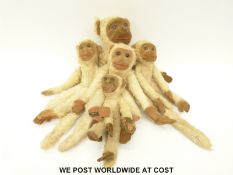 Five Nora Wellings monkeys of graduated sizes, all with felt faces, hands and feet,
