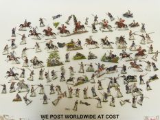 Ninety-nine painted pressed metal soldiers