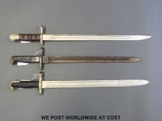 Three various American bayonets comprising Remmington indistinctly marked possibly 1915,