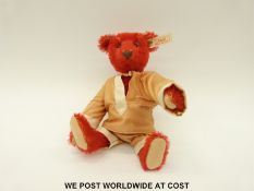 Steiff Original Alfonso Teddy Bear with red shaved mohair, jointed limbs, and Cossack outfit,