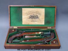 A pair of Hollis & Sheath percussion hammer action duelling pistols with named eight inch octagonal
