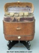 A 19th century double ended leather shotgun cartridge holder with capacity for 24 cartridges