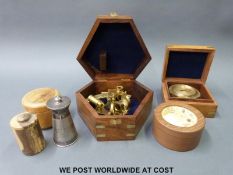 A cased sextant, compass,