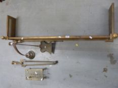 A brass fire fender, companion set,