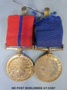 A pair of Metropolitan Police medals, one Queen Victoria's jubilee the other Edward VII,