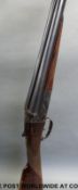 AYA model 4 12 bore side by side shotgun with ornate engraving , chequered grip and forend,