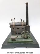 Marklin stationary live steam engine with slip eccentric reversing, imitation governor, whistle,