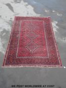 A large rug with red ground (200x290cm)