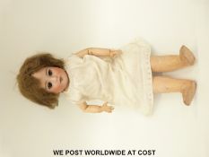 SFBJ (Societe Francaise de Fabrication de Bebes et Jouets) bisque headed doll with open mouth,
