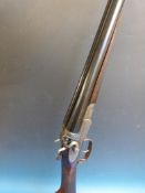 Daniel Fraser 12 bore side by side hammer action shotgun with all over scrolling engraving,