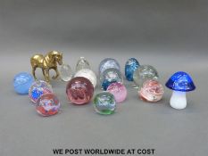 A collection of glass paperweights including Selkirk, Caithness, etc, some in original boxes.