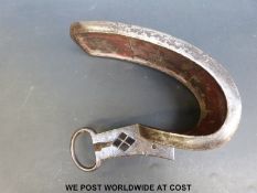 A Japanese Edo period silver wire inlaid and signed abumi or stirrup.