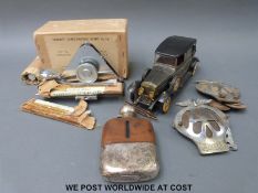 A vintage 'Serpent' label printing outfit no 35 in original box, two AA car badges,