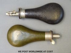 Two steel and leather powder flasks both with white metal mounts, one by Sykes.