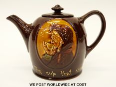 Royal Doulton Kingsware teapot inscribed 'The Cup that Cheers' (13cm tall)