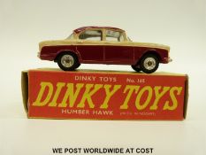 Dinky Toys diecast model Humber Hawk with windows and two-tone maroon and cream body, 165,