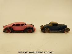 Two American diecast model cars Manoil 1930 Streamlined Sedan with pink and black body and pink