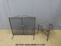 A metal fire guard and similar trivet