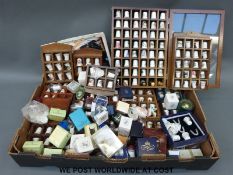 A large collection of thimbles and stands including Wedgwood, Royal Doulton, Brambly Hedge,