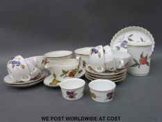 A collection of Royal Worcester Evesham Gold to include flan dish, soufflé dishes, soup bowls,