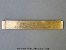 A 19thC brass double sided spring loaded percussion cap loading tool marked Reverend I.