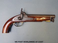 Percussion overcoat pistol with brass butt plate and trigger guard,