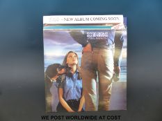 Nine promo/white label rock albums and rare promo items of advertising.