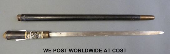 An early 20thC Indian sword stick with ebony shaft,