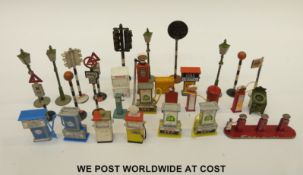 Twenty nine Dinky and other diecast and similar petrol pumps,
