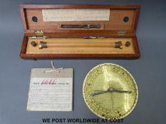 A cased W H Harling ministry marked boxwood parallel rule and a circular plotter