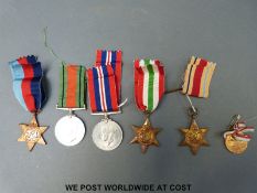 A WWII medal group comprising war medal, defence medal, 1939-45 star,