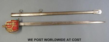 A Scottish basket hilt replica broadsword with steel blade and scabbard,