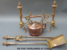 A 19th century brass companion set comprising shovel, tongs, and dogs,