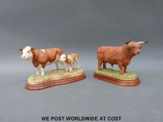 A Border Fine Arts model of a Simmental cow and calf and a further Border Fine Arts model of a