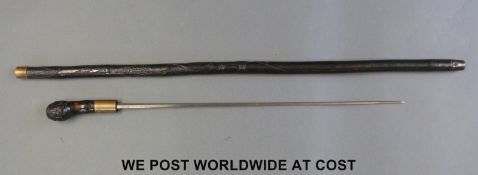 A 19thC or early 20thC sword stick with 55cm four faceted tapering steel blade,