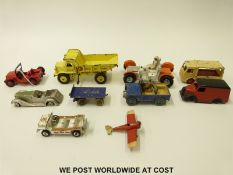 Ten Dinky Toys diecast model vehicles including Electric Van, Aeroplane, Land Rover,