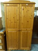 A pine wardrobe (W100 x D53 x H187cm)