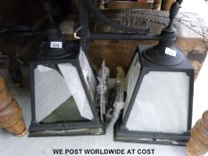 A pair of outside lamps in the form of a pair of Victorian lanterns with fittings (unused)