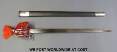 A Scottish basket hilt replica broadsword with leather effect scabbard,